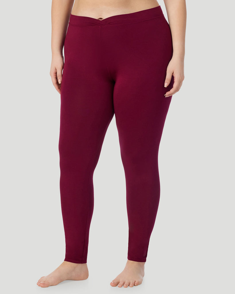  A Plus size lady wearing Scarlet Softwear With Stretch Long Sleeve Crew PLUS in a front facing side angle pose