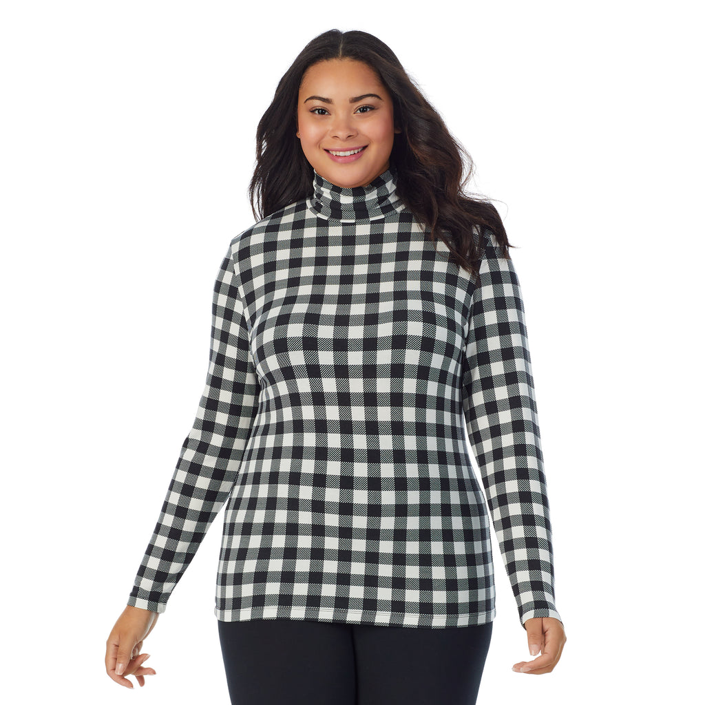A lady wearing ivory buffalo long sleeve turtleneck plus softwear with stretch top.