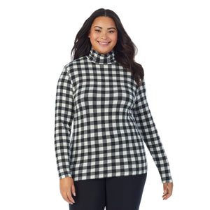 A lady wearing ivory buffalo long sleeve turtleneck plus softwear with stretch top.