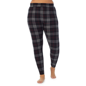 A lady wearing black plaid fleecewear with stretch legging plus. !59% Polyester, 35% Recycled Polyester, 6% Spandex !