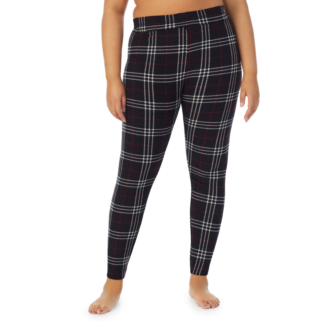 A lady wearing black plaid fleecewear with stretch legging plus. !59% Polyester, 35% Recycled Polyester, 6% Spandex !