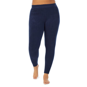 A lady wearing navy blazer fleecewear with stretch legging plus. !59% Polyester, 35% Recycled Polyester, 6% Spandex !