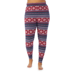 A lady wearing navy fairisle fleecewear with stretch legging plus. !59% Polyester, 35% Recycled Polyester, 6% Spandex !