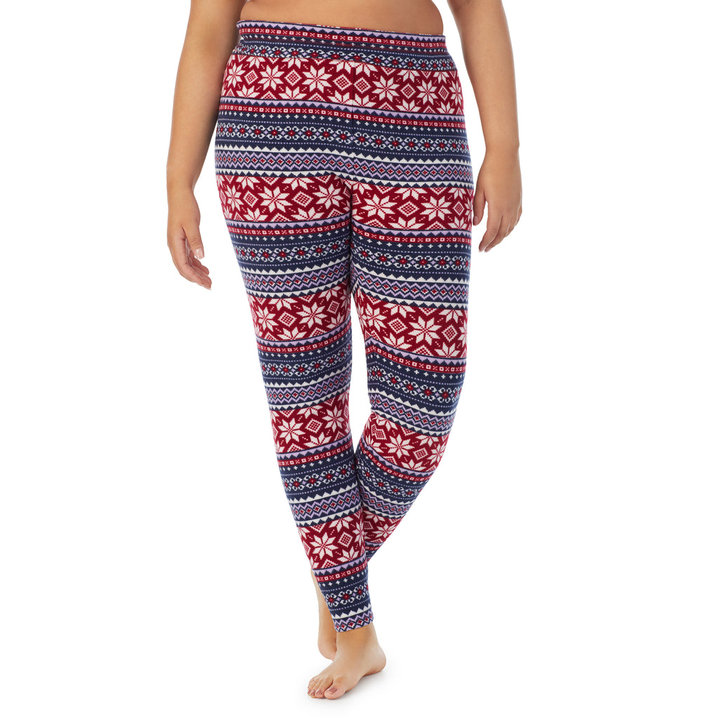 A lady wearing navy fairisle fleecewear with stretch legging plus. !59% Polyester, 35% Recycled Polyester, 6% Spandex !