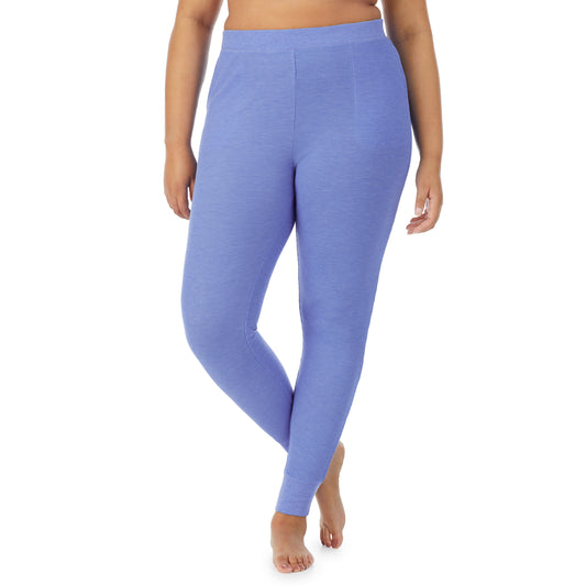 A lady wearing a Ultramarine Heather legging plus.