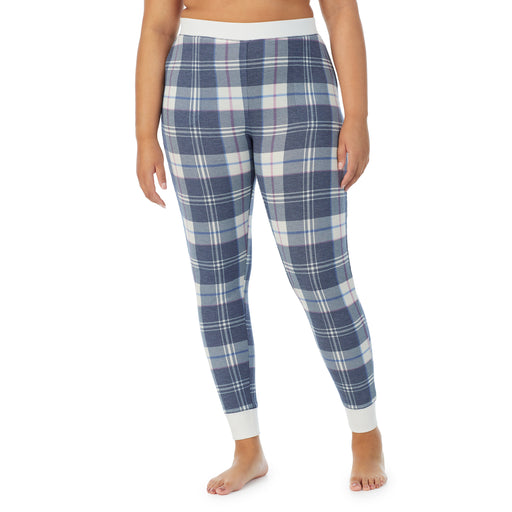 Blue Plaid;Model is wearing size 1X. She is 5’11”, Bust 36”, Waist 36.5”, Hips 47.5”. @A lady wearing a Blue Plaid legging plus.