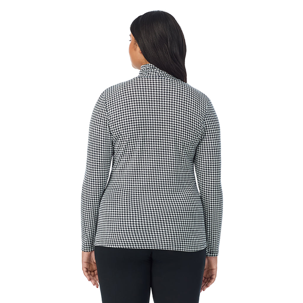 Ivory Houndstooth; Model is wearing size 1X. She is 5'11", Bust 36", Waist 36.5", Hips 47.5". @A lady wearing ivory houndstooth long sleeve turtleneck plus softwear with stretch top.