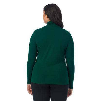 Evergreen; Model is wearing size 1X. She is 5'11", Bust 36", Waist 36.5", Hips 47.5". @A lady wearing evergreen long sleeve turtleneck plus softwear with stretch top.