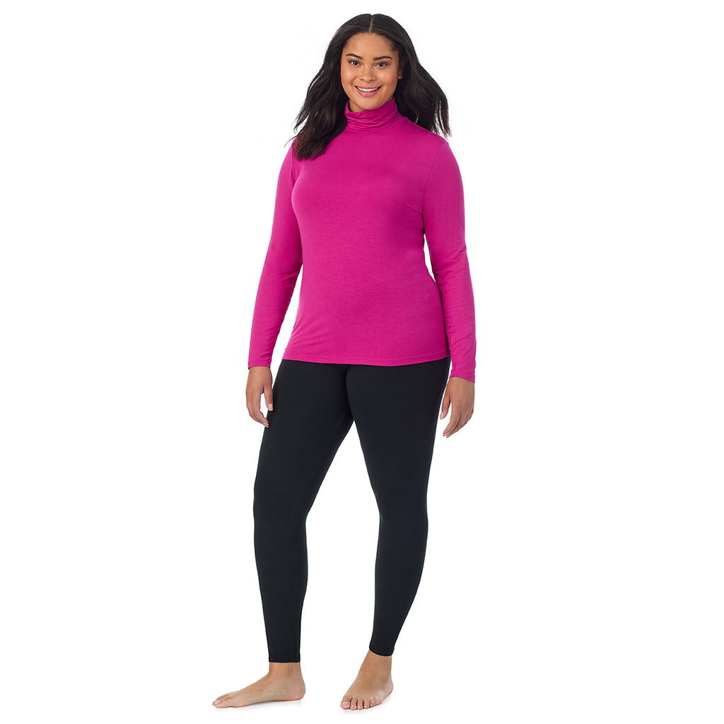 A lady wearing deep fuschia long sleeve turtleneck plus softwear with stretch top.