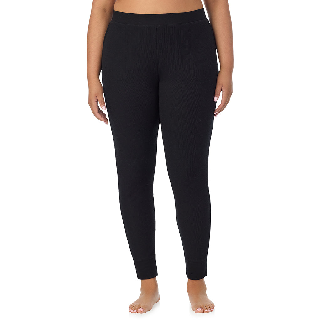 Black; Model is wearing size 1X. She is 5'11", Bust 36", Waist 36.5", Hips 47.5"@ A Lady is wearing a Black Cozy Stretch Thermal Legging PLUS