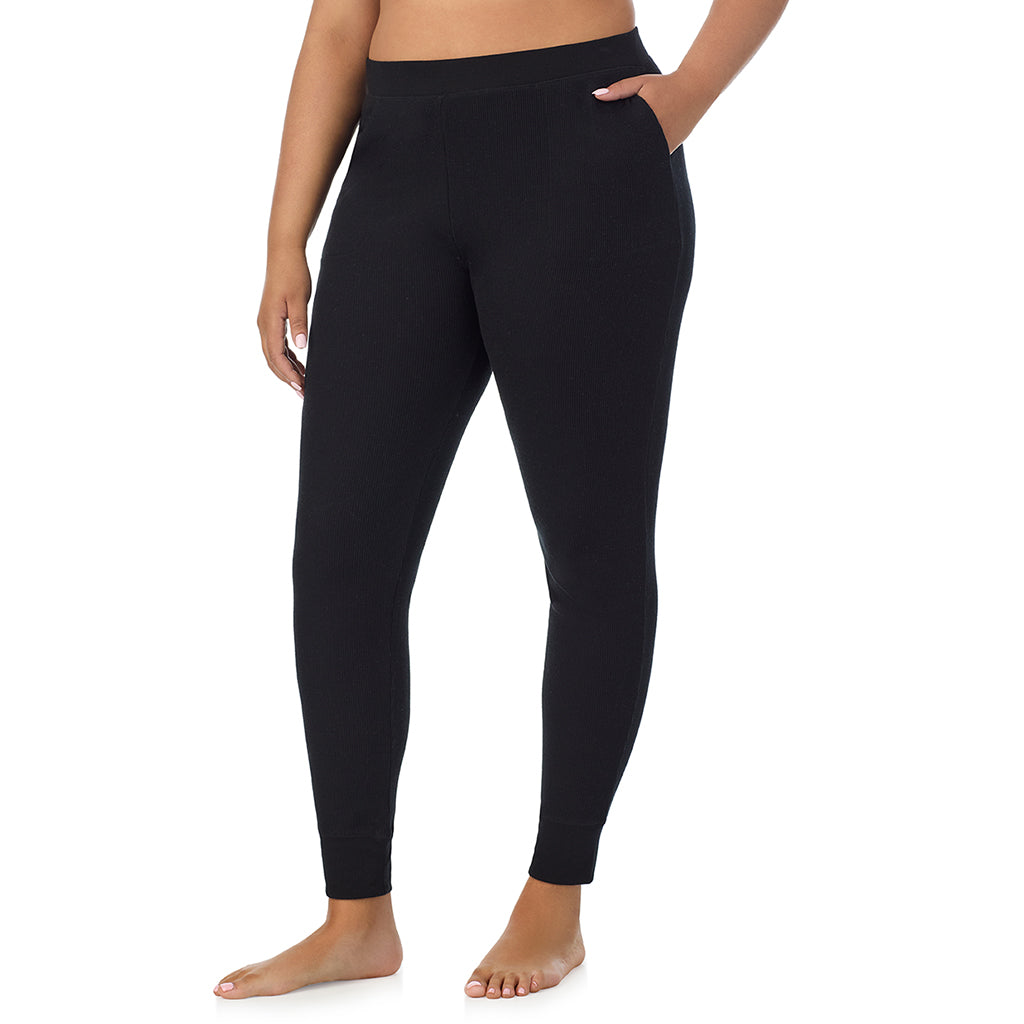 Black; Model is wearing size 1X. She is 5'11", Bust 36", Waist 36.5", Hips 47.5"@ A Lady is wearing a Black Cozy Stretch Thermal Legging PLUS