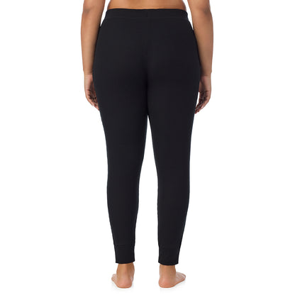 Black; Model is wearing size 1X. She is 5'11", Bust 36", Waist 36.5", Hips 47.5"@ A Lady is wearing a Black Cozy Stretch Thermal Legging PLUS