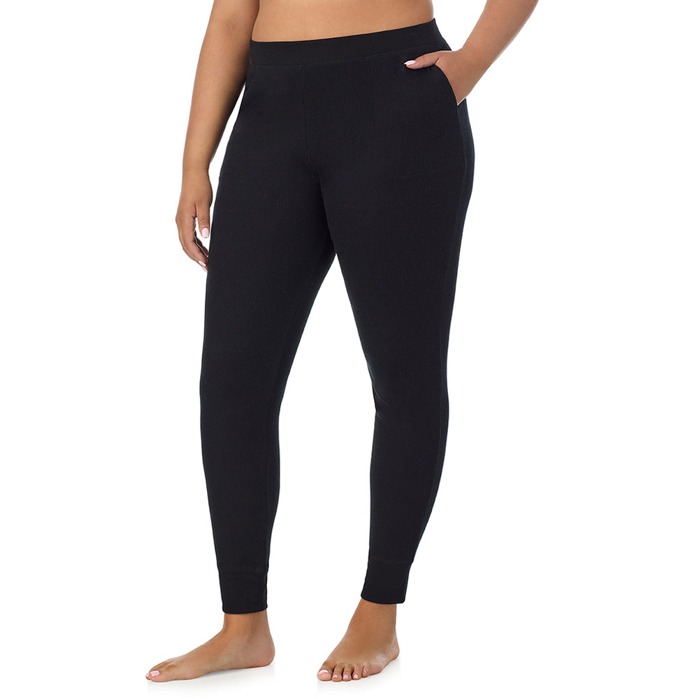 A Lady is wearing a Black Cozy Stretch Thermal Legging PLUS