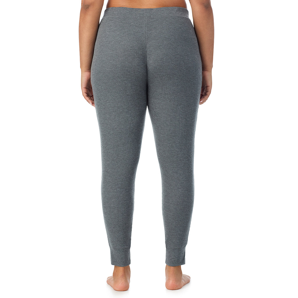  A Lady is wearing a Stone Grey Heather Cozy Stretch Thermal Legging PLUS