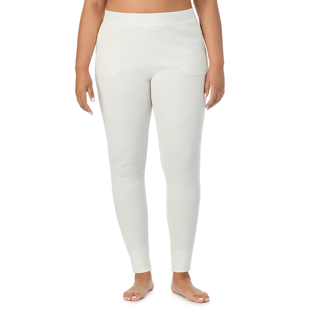 A Lady is wearing a Ivory Cozy Stretch Thermal Legging PLUS