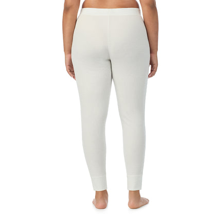 Ivory; Model is wearing size 1X. She is 5'11", Bust 36", Waist 36.5", Hips 47.5"@ A Lady is wearing a Ivory Cozy Stretch Thermal Legging PLUS