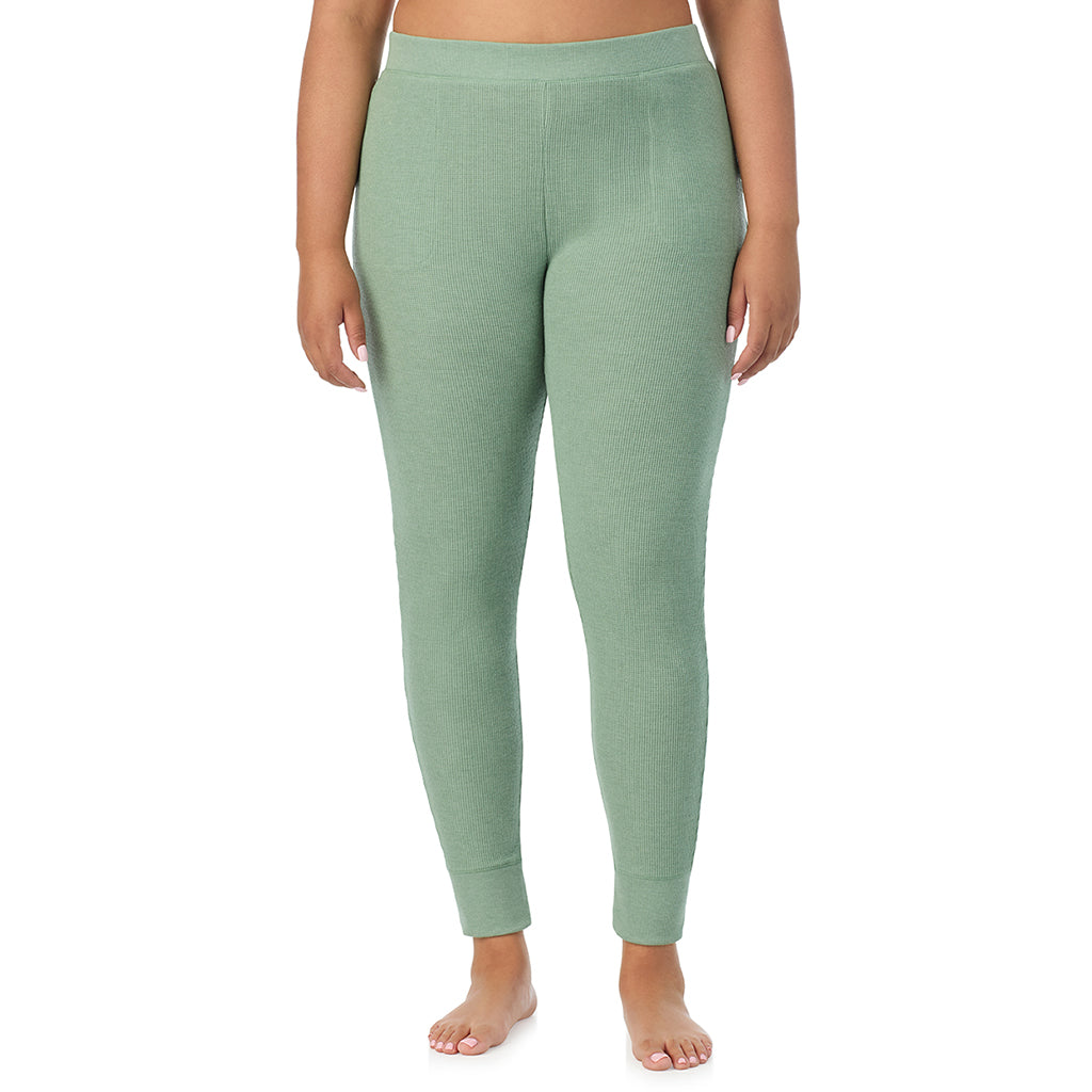  A Lady is wearing a Soft Olive Heather Cozy Stretch Thermal Legging PLUS