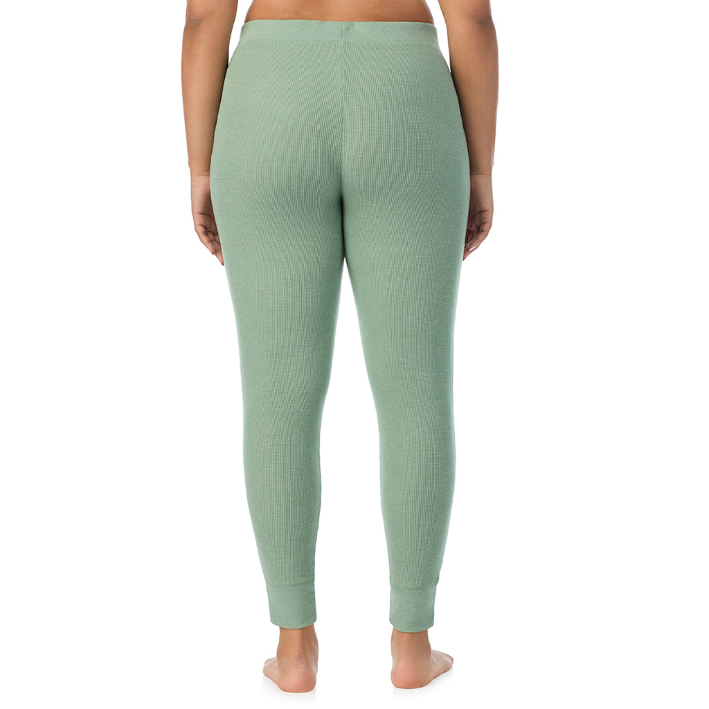  A Lady is wearing a Soft Olive Heather Cozy Stretch Thermal Legging PLUS