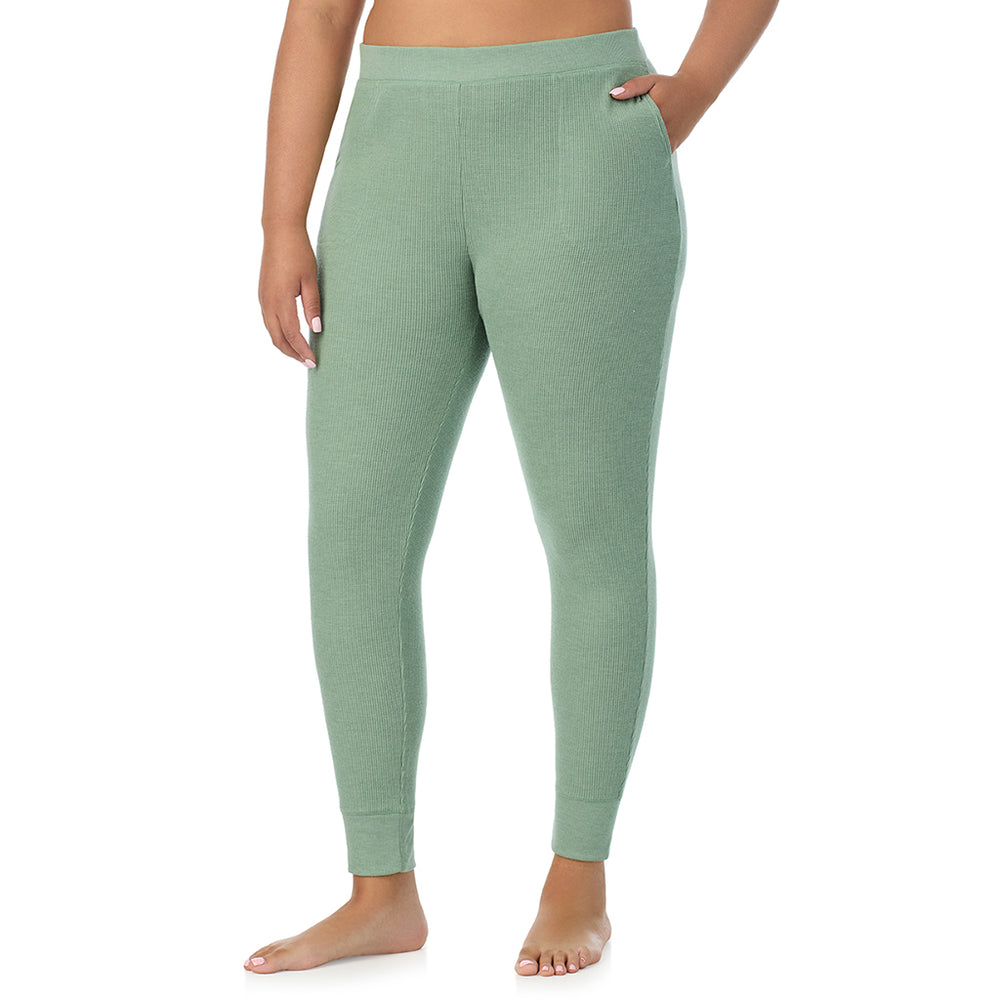A Lady is wearing a Soft Olive Heather Cozy Stretch Thermal Legging PLUS