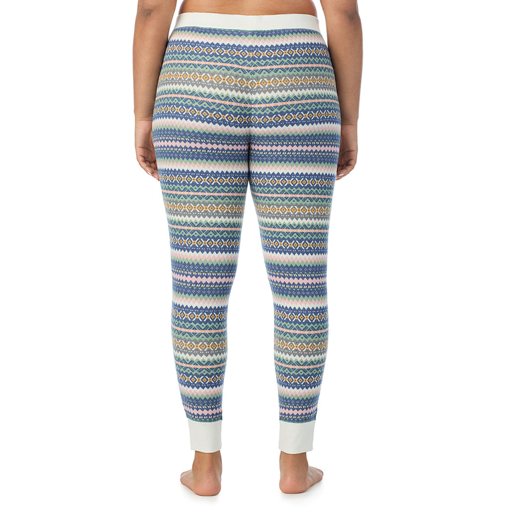  A Lady is wearing a Green Fairisle Cozy Stretch Thermal Legging PLUS