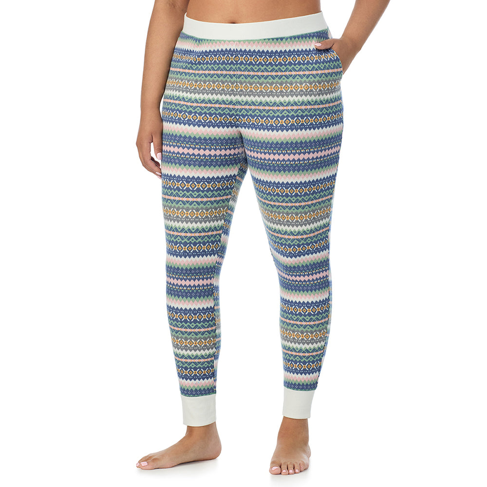 A Lady is wearing a Green Fairisle Cozy Stretch Thermal Legging PLUS