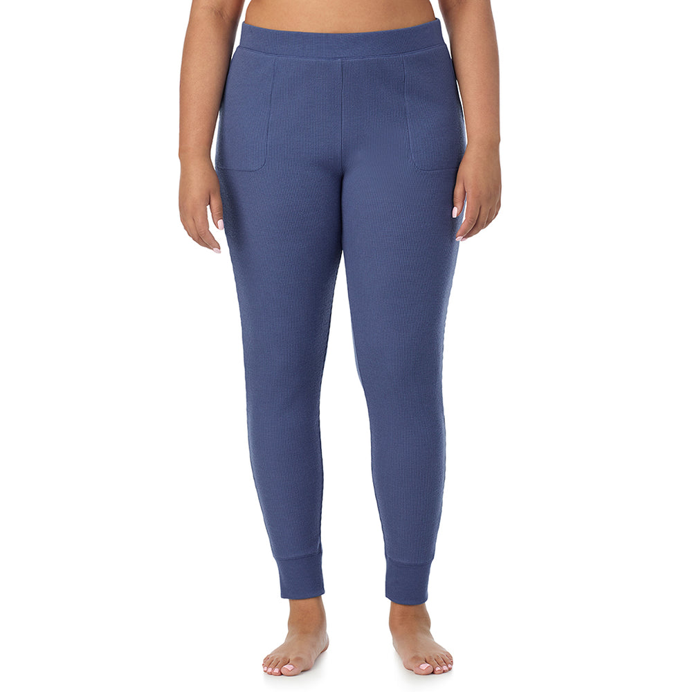 A Lady is wearing a Smoke Blue Cozy Stretch Thermal Legging PLUS