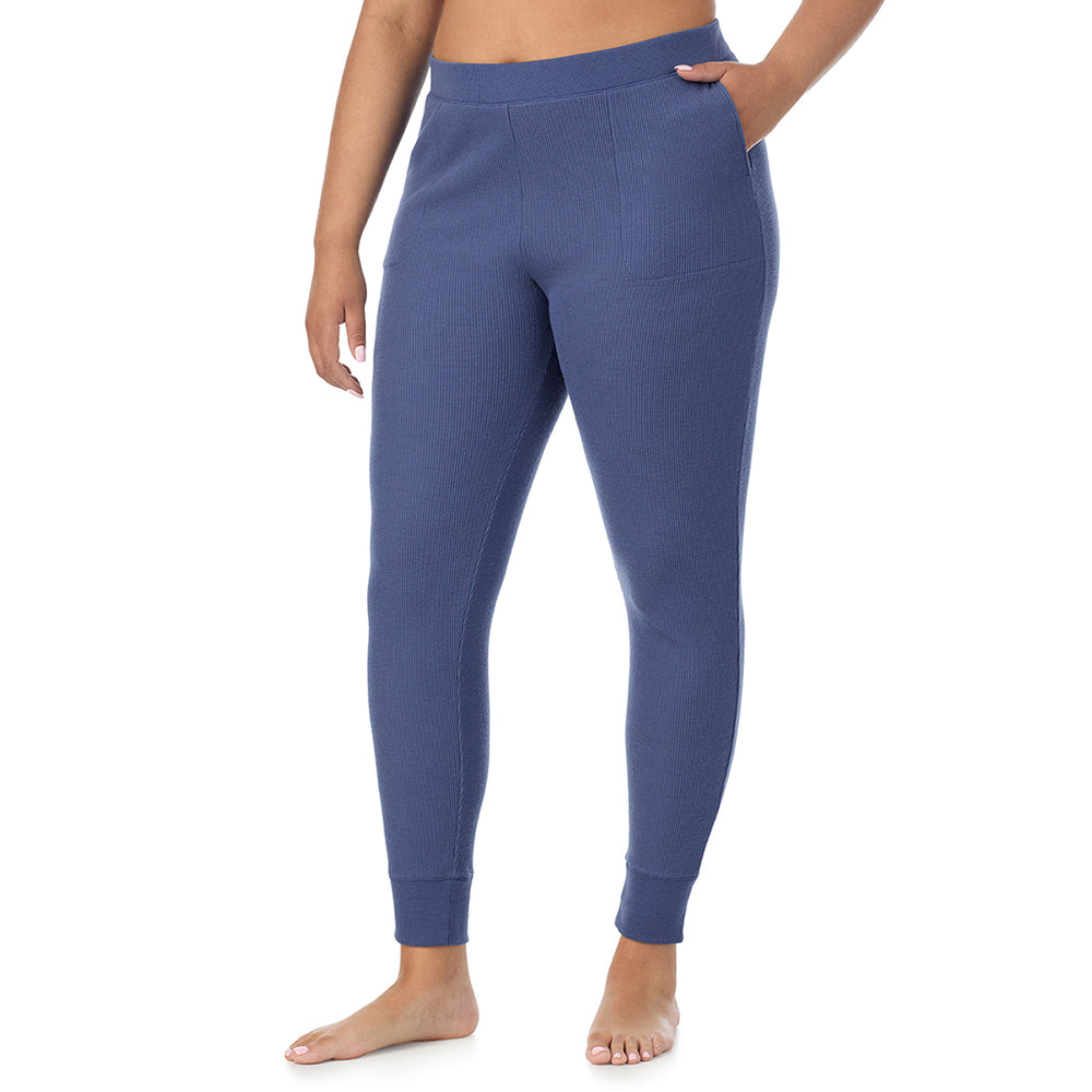 A Lady is wearing a Smoke Blue Cozy Stretch Thermal Legging PLUS