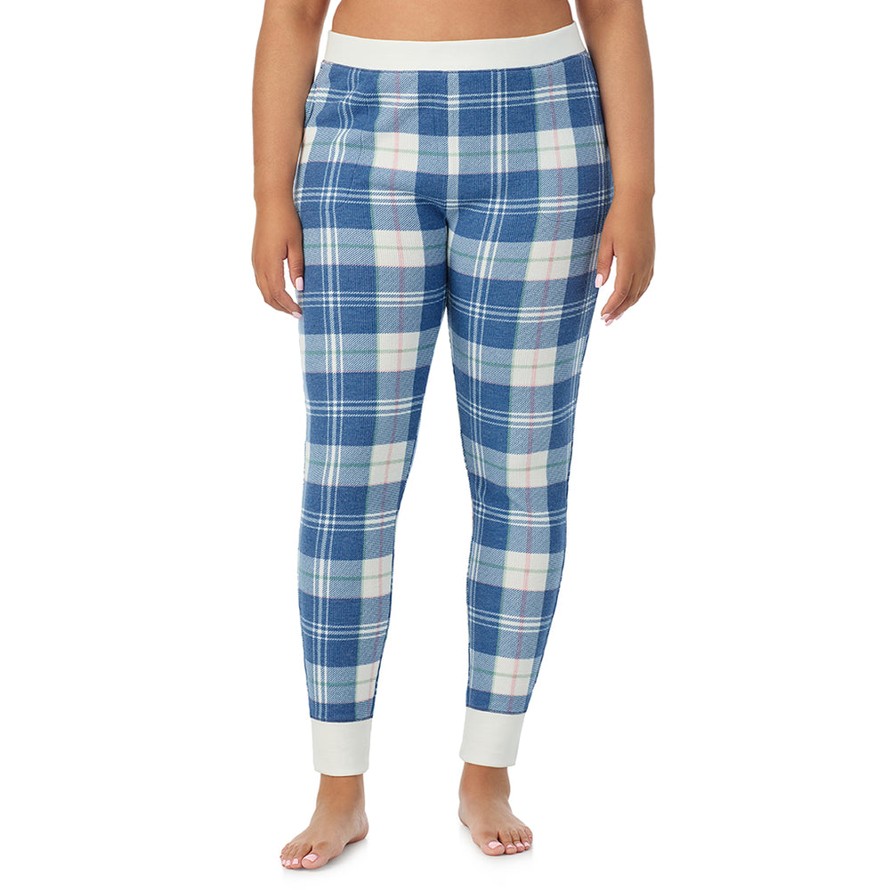 A Lady is wearing a Blue Plaid Cozy Stretch Thermal Legging PLUS