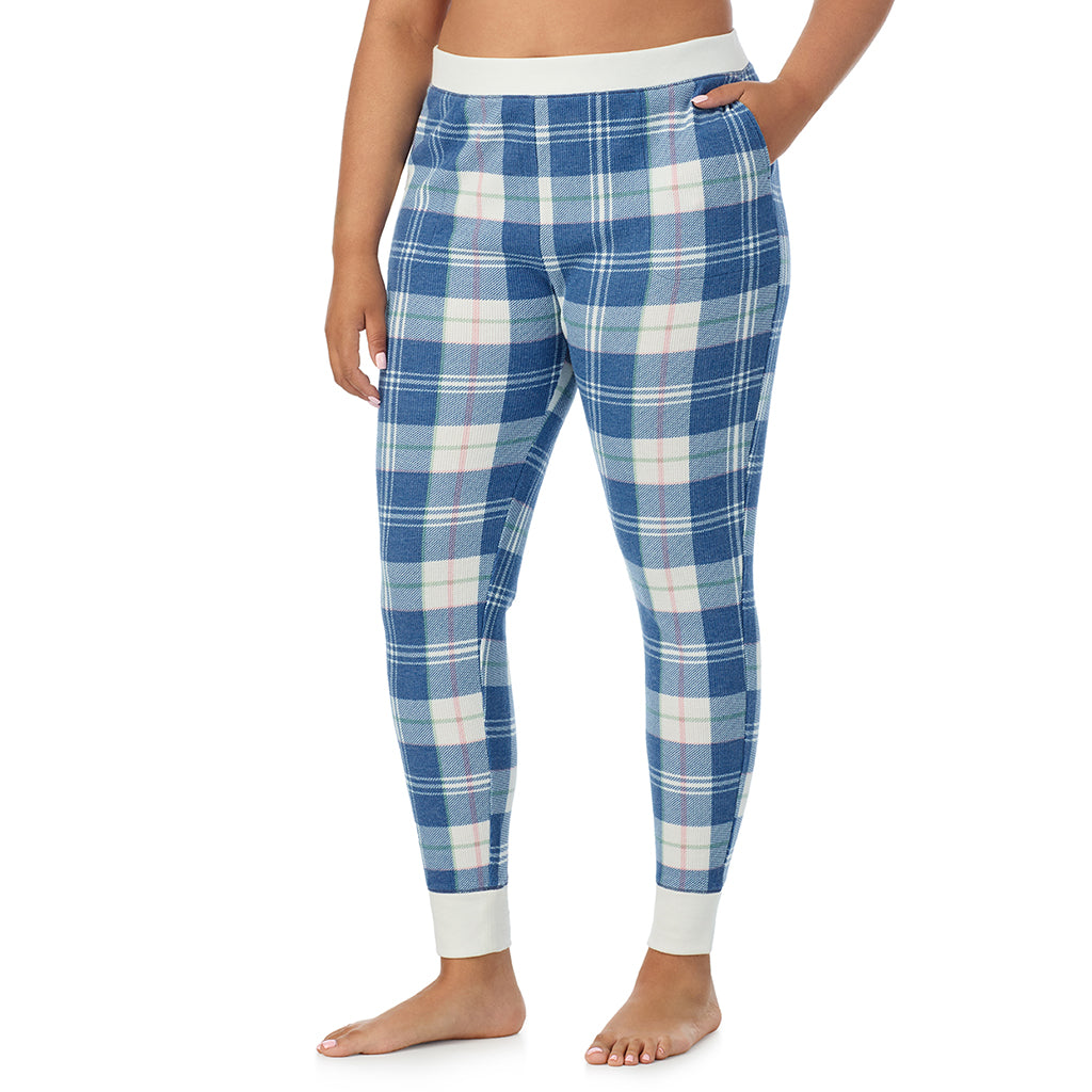  A Lady is wearing a Blue Plaid Cozy Stretch Thermal Legging PLUS