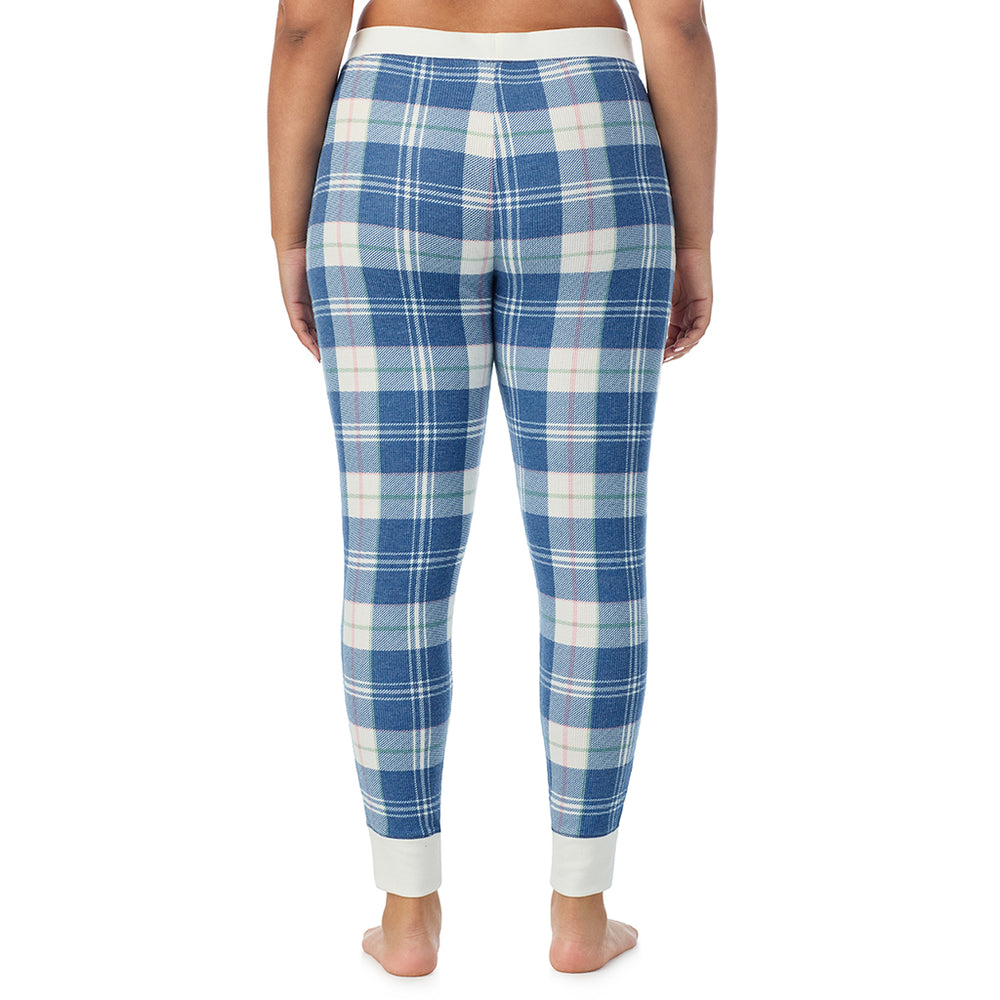 A Lady is wearing a Blue Plaid Cozy Stretch Thermal Legging PLUS