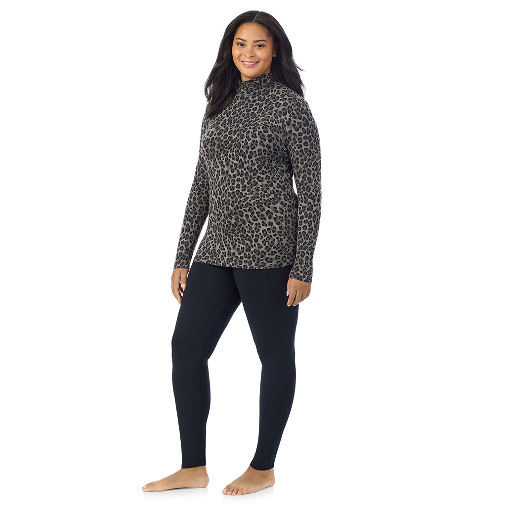Charcoal Leopard; Model is wearing size 1X. She is 5'11", Bust 36", Waist 36.5", Hips 47.5". @A lady wearing charcoal leopard long sleeve turtleneck plus softwear with stretch top.