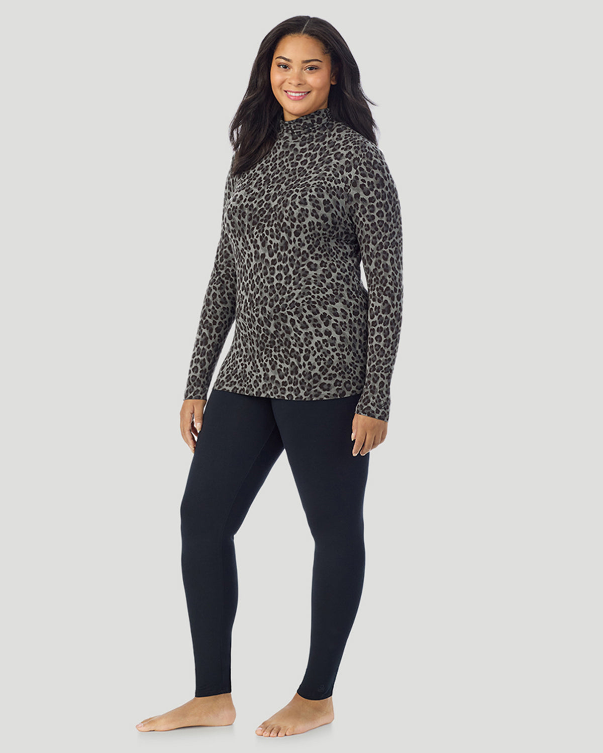  A plus size Lady wearing Charcoal Leopard Softwear With Stretch Long Sleeve Turtleneck PLUS in a front view standing pose