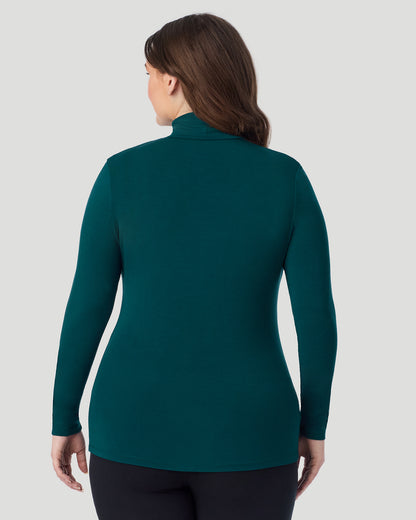  A plus size Lady wearing Deep Emerald Softwear With Stretch Long Sleeve Turtleneck PLUS in a back view pose
