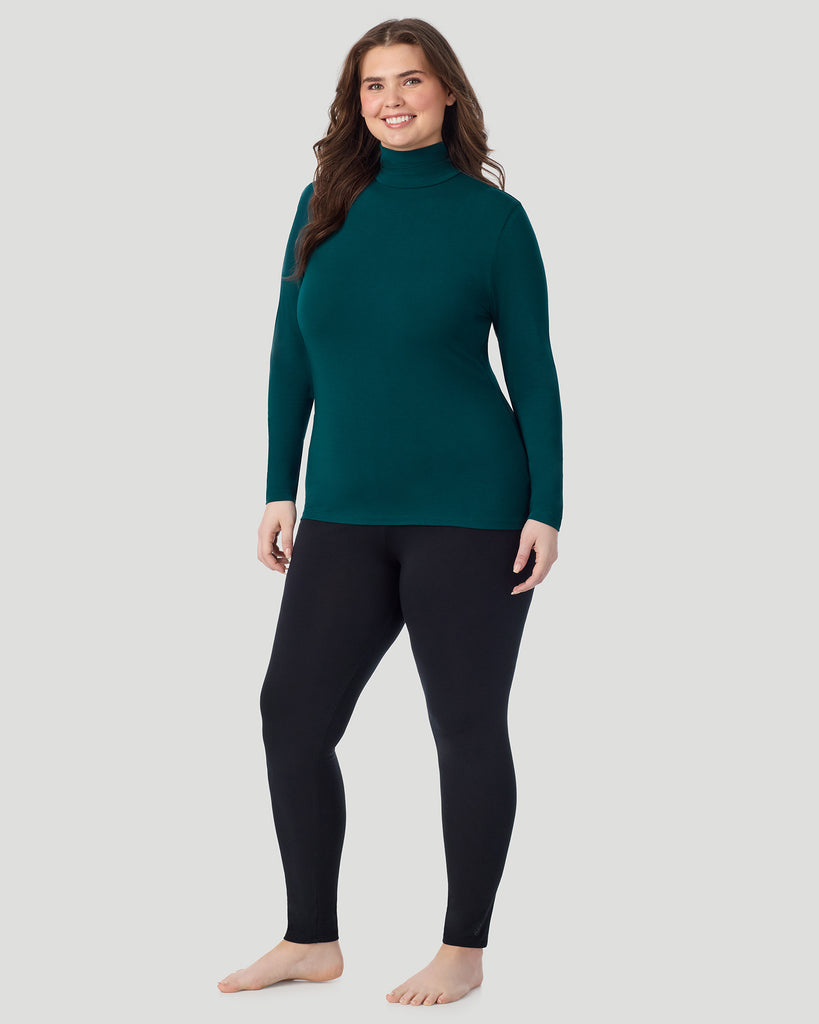  A plus size Lady wearing Deep Emerald Softwear With Stretch Long Sleeve Turtleneck PLUS in a front view standing pose
