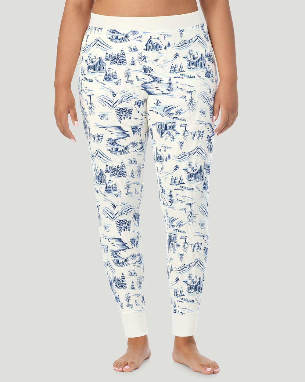 A plus size Lady wearing Blue Winter Toile Cozy Stretch Thermal Legging PLUS in a front view pose