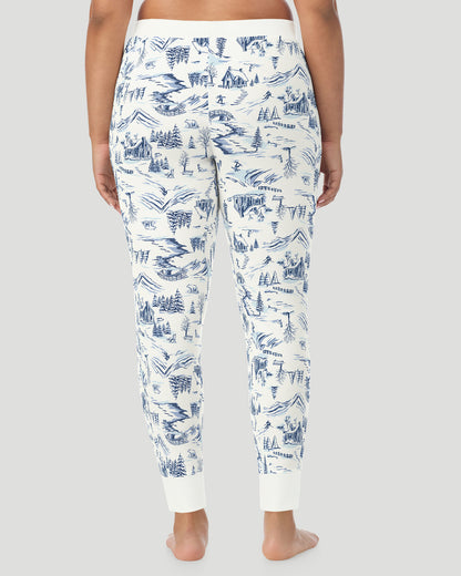  A plus size Lady wearing Blue Winter Toile Cozy Stretch Thermal Legging PLUS in a back view pose
