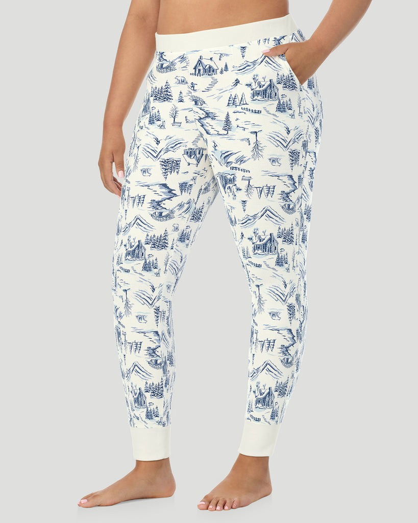  A plus size Lady wearing Blue Winter Toile Cozy Stretch Thermal Legging PLUS in a side view pose