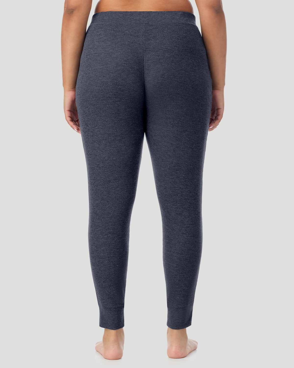  A plus size Lady wearing Medieval Blue Heather Cozy Stretch Thermal Legging PLUS in a back view pose