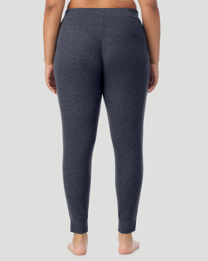  A plus size Lady wearing Medieval Blue Heather Cozy Stretch Thermal Legging PLUS in a back view pose