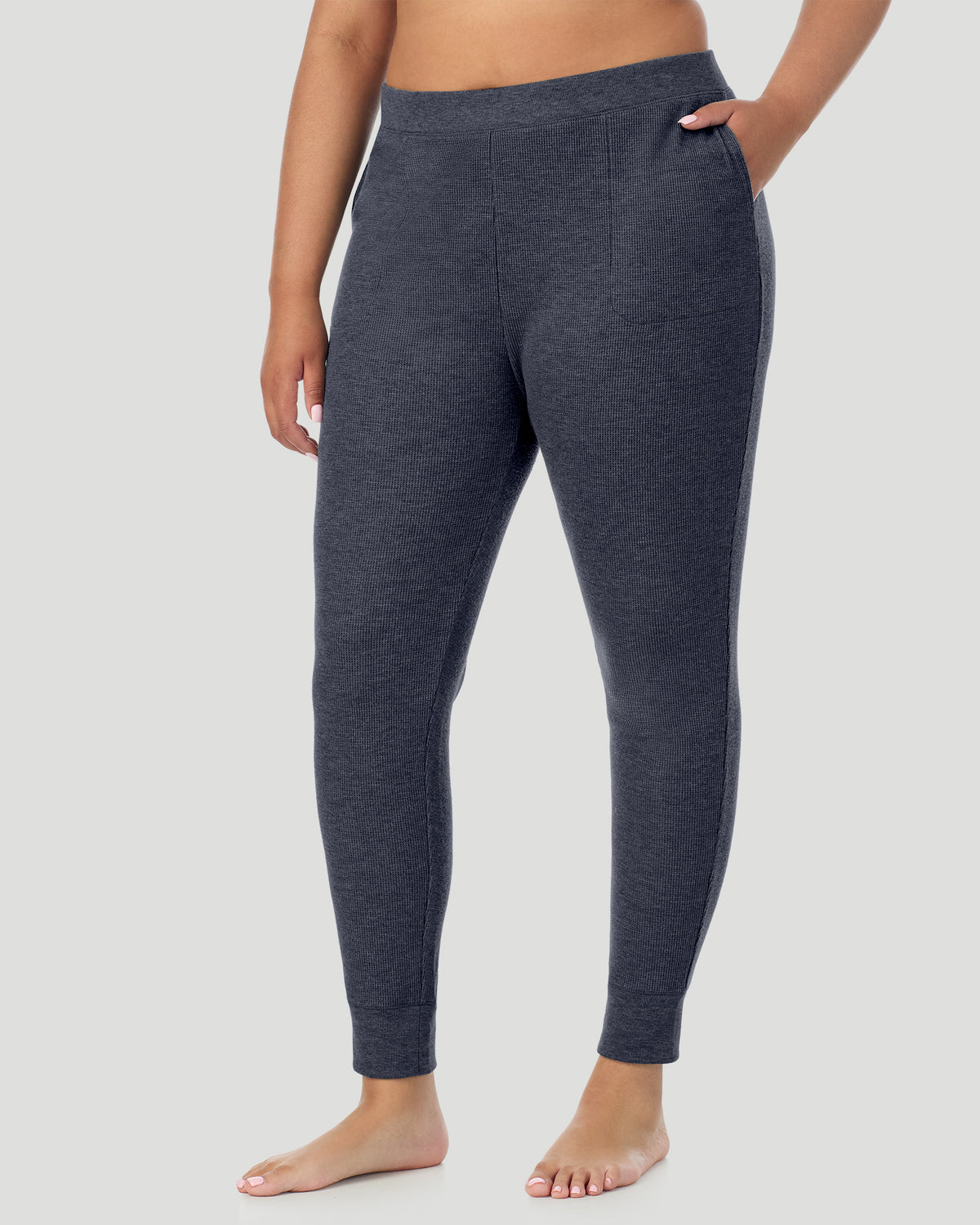  A plus size Lady wearing Medieval Blue Heather Cozy Stretch Thermal Legging PLUS in a side view pose