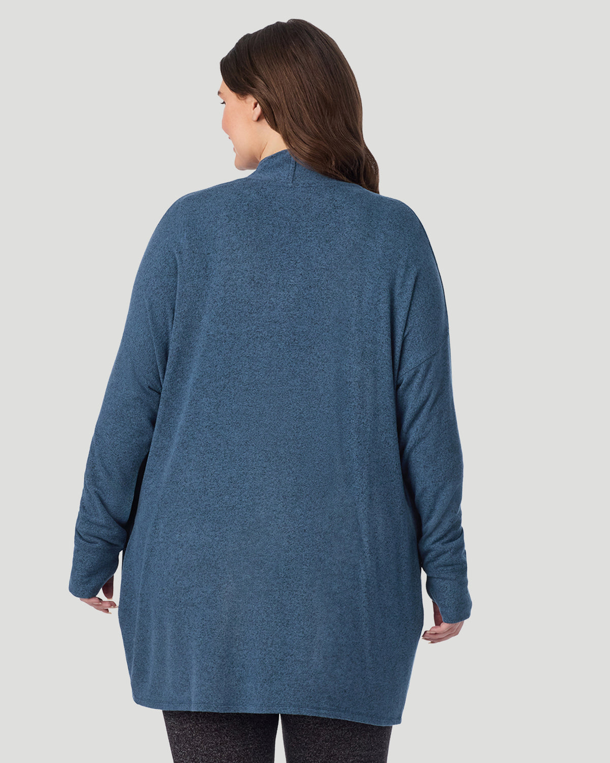 Deep Chambray; Model is wearing size 1X. She is 5'10", Bust 44", Waist 36", Hips 49". @ A plus size Lady wearing Deep Chambray SoftKnit Wrap PLUS in a back look closer view
