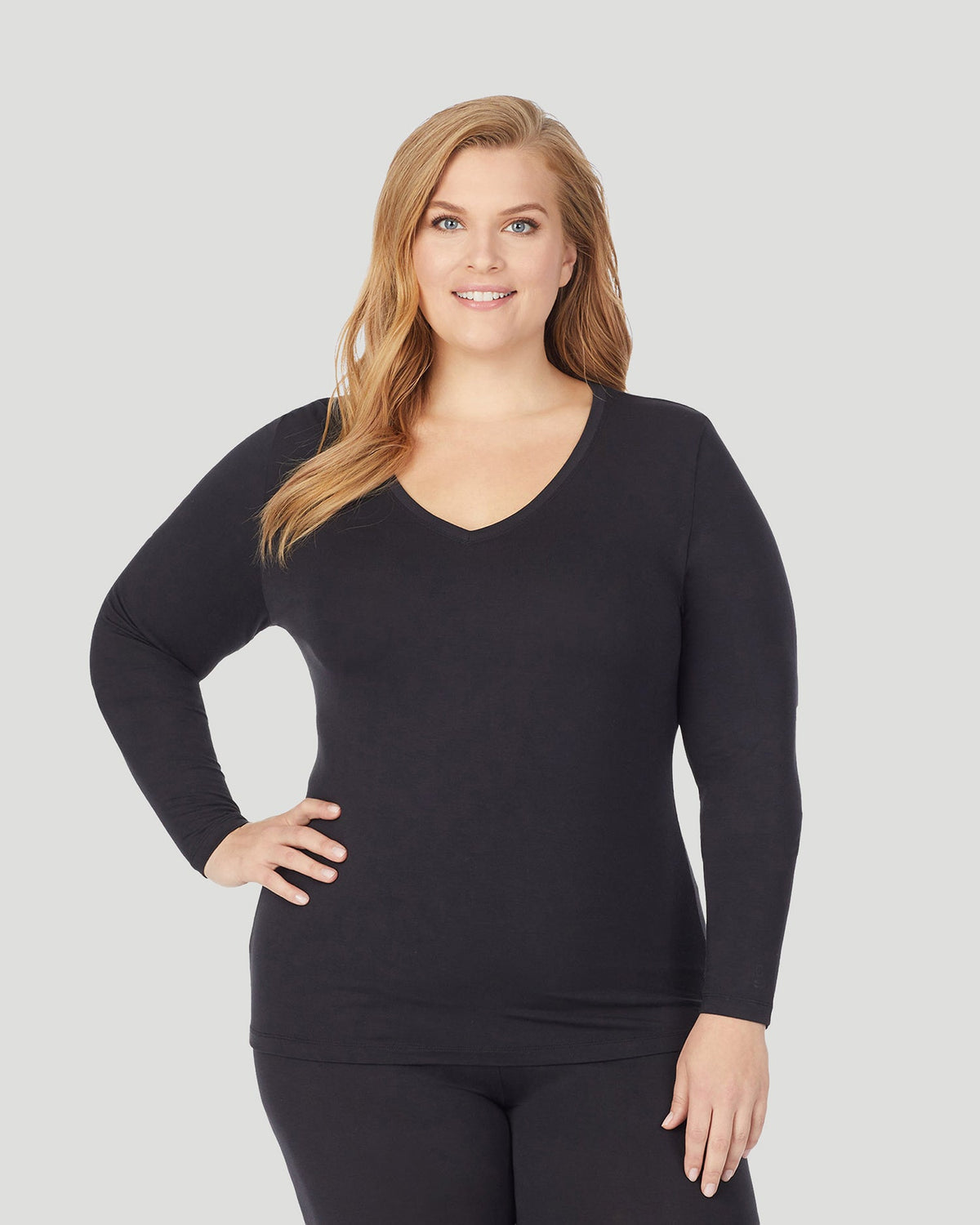 A lady wearing Softwear With Stretch Long Sleeve V-Neck PLUS in Black  