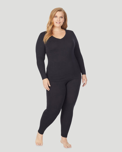 A lady wearing Softwear With Stretch Long Sleeve V-Neck PLUS in Black side view side view