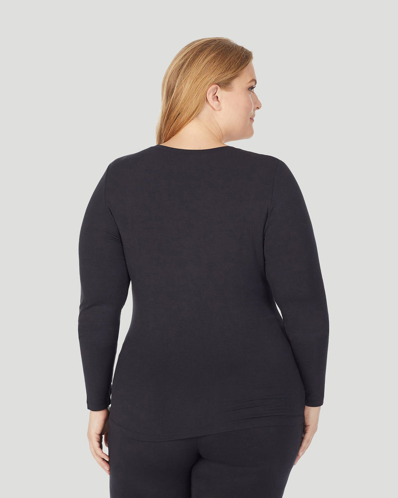 A lady wearing Softwear With Stretch Long Sleeve V-Neck PLUS in Black back view back view