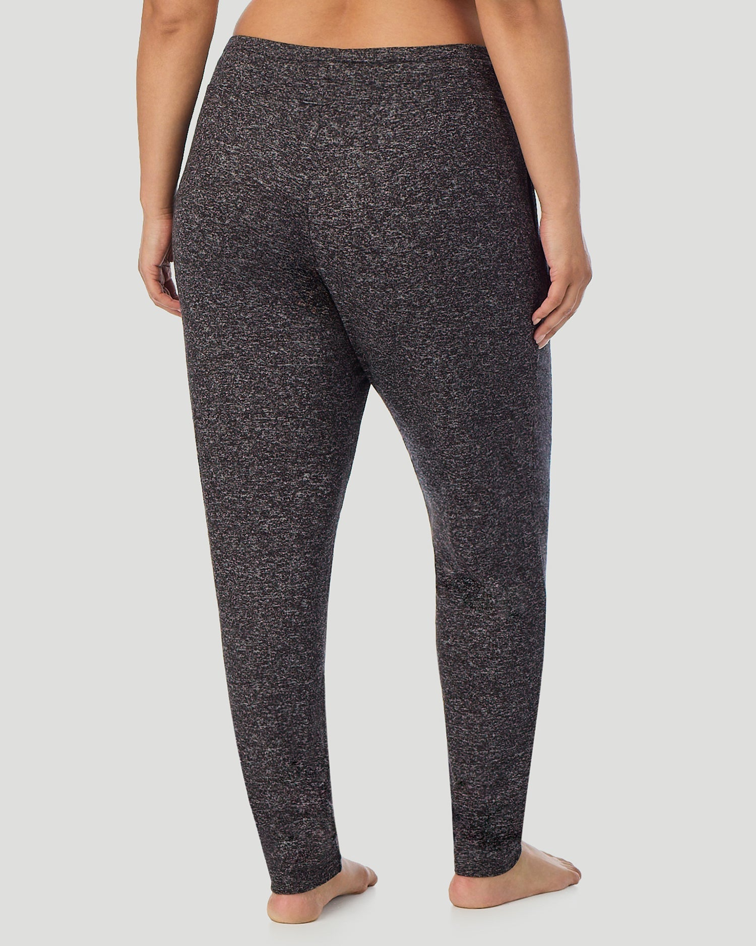 A lady wearing SoftKnit Jogger PLUS in Marled Dark Charcoal side view side view