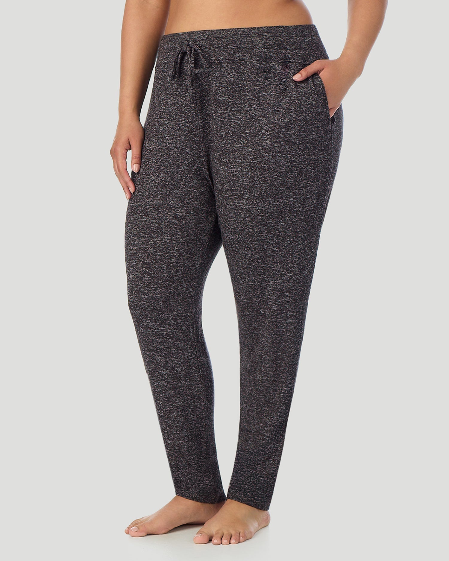 A lady wearing SoftKnit Jogger PLUS in Marled Dark Charcoal back view back view