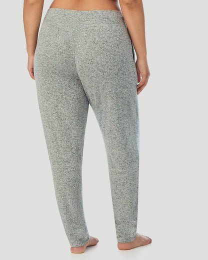 A lady wearing SoftKnit Jogger PLUS in Marled Grey back view back view