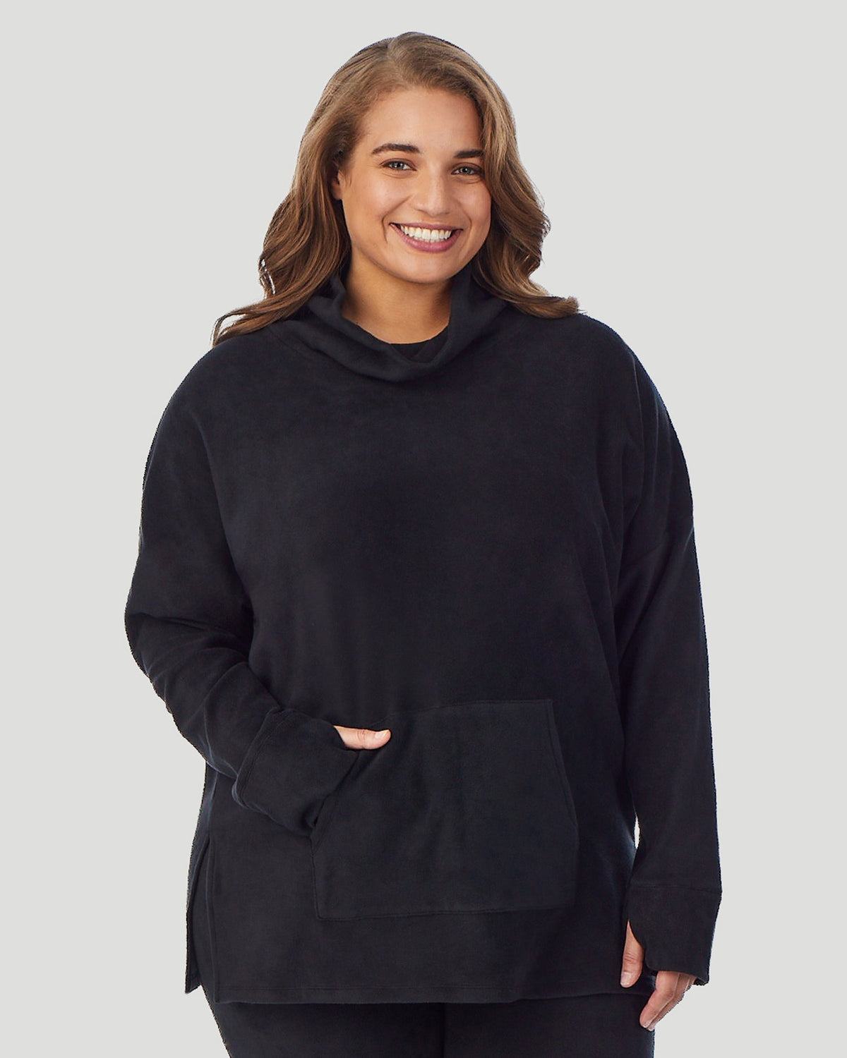 A lady wearing Fleecewear With Stretch Long Sleeve Tunic PLUS in Black  