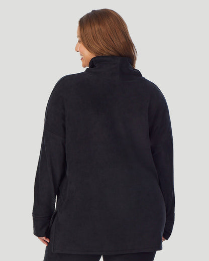 A lady wearing Fleecewear With Stretch Long Sleeve Tunic PLUS in Black back view back view