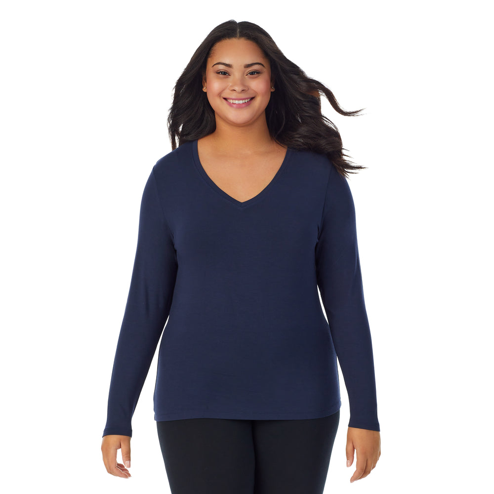 A lady wearing Softwear With Stretch Long Sleeve V-Neck PLUS in Navy Blazer
